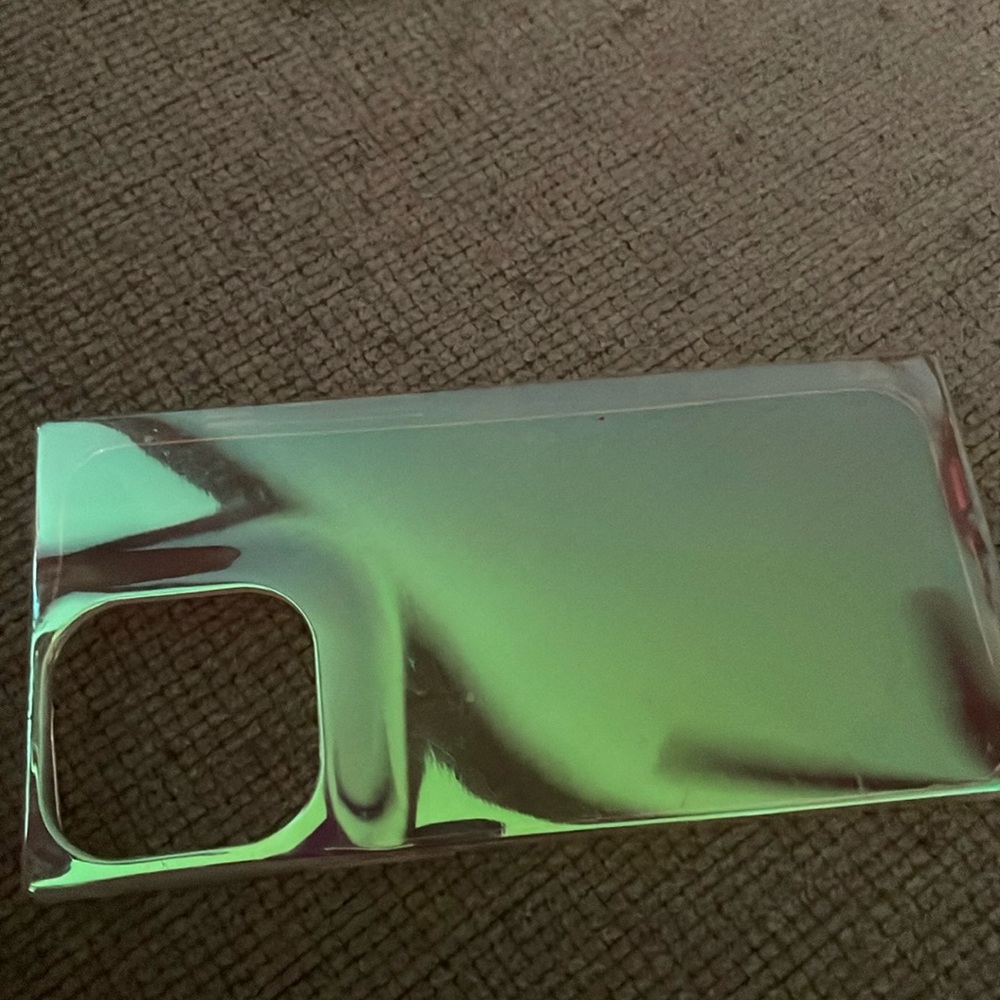 Case for iPhone. One black and one with mirror shine to it. Sold separately.